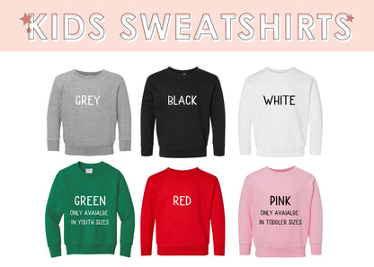 Collection of kids sweatshirts in various colors with text labels on a white background.