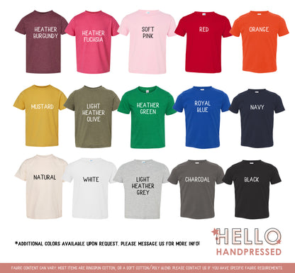 Collection of t-shirts in various colors with text labels on a white background, featuring the brand 'Hello Handpressed'.